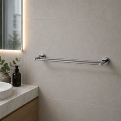 Bathroom setting with a towel rail on a tiled wall, sink, and decorative elements.