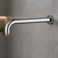 Chrome shower arm mounted on a gray tiled wall