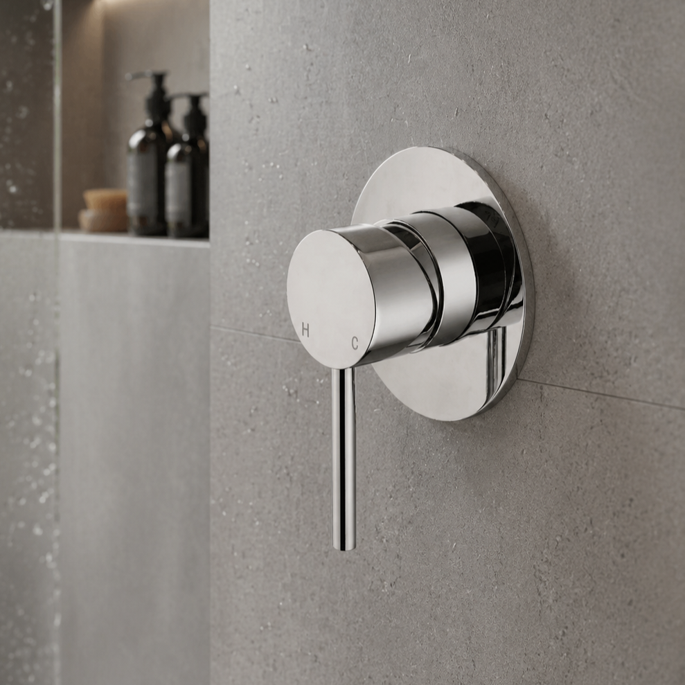 Chrome shower control valve on a gray tiled wall - Wall Mixer