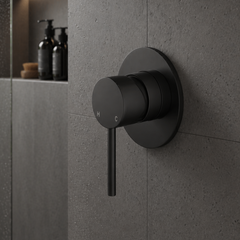 Black shower control valve on a gray tiled wall- Wall Mixer